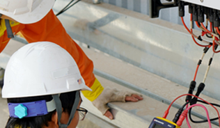 two people conducting a solar panel assessment