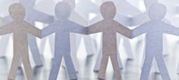 Paper men holding hands